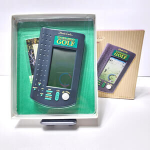 Radica Tournament Golf Monte Carlo Handheld Video Game w/ Golf Ball Tested Works